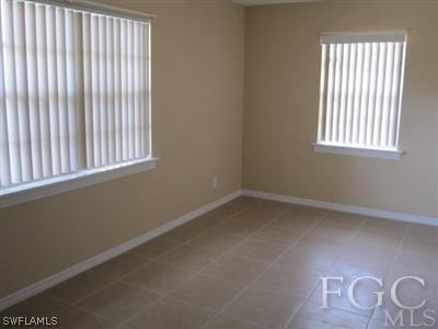 2120 Earl Road Fort Myers, FL 33901 - Photo 6 of 10 an empty room with a window
