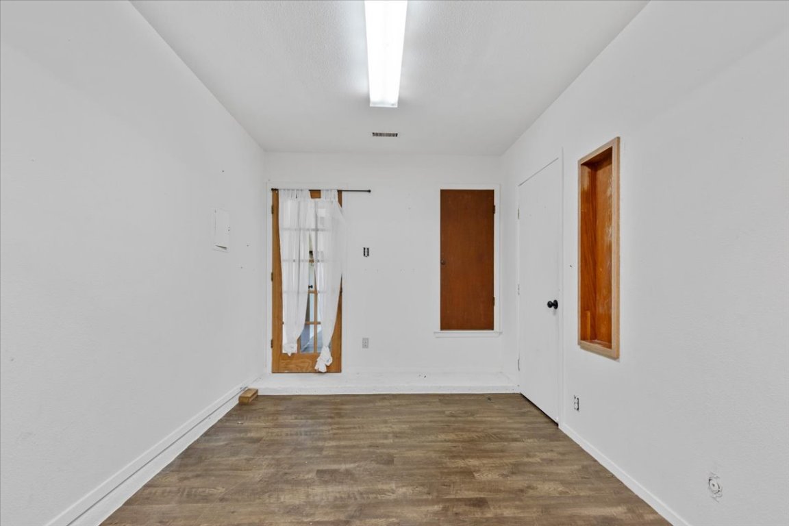 511 Suzzane Road Pflugerville, TX 78660 - Photo 20 of 34 Flex room featuring dark wood-style flooring