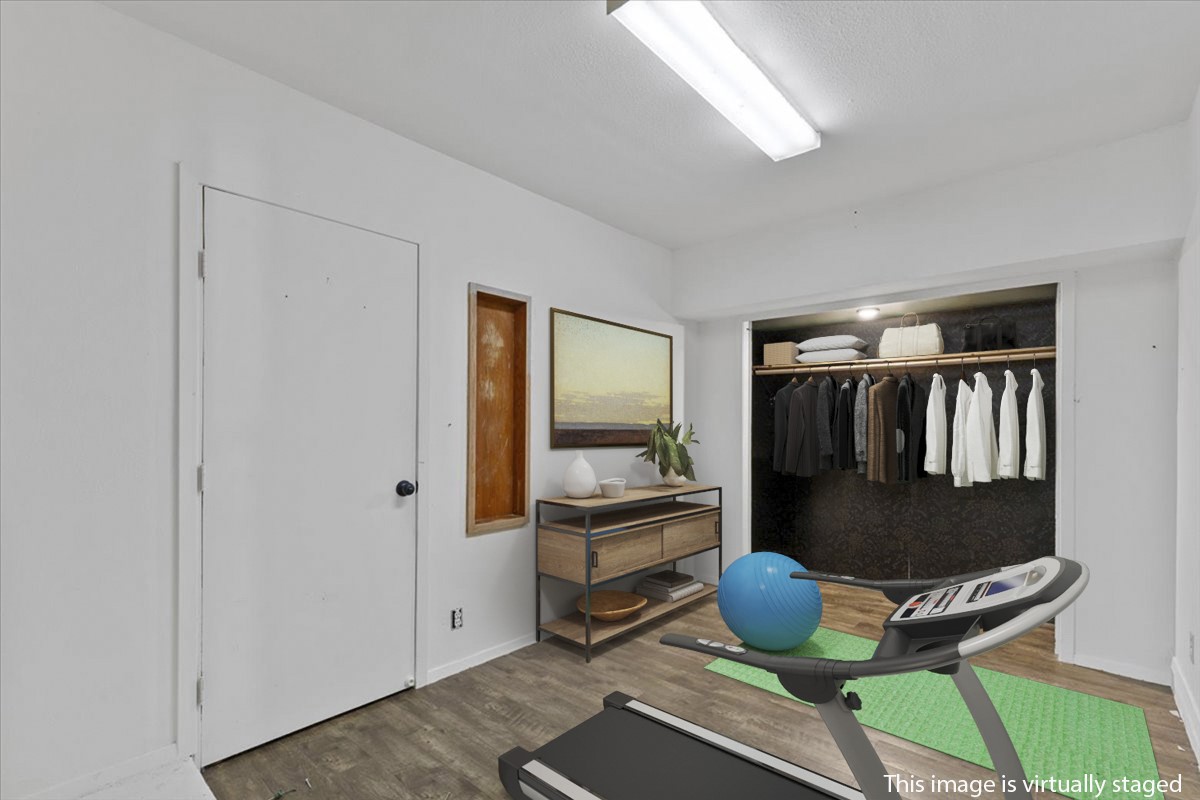 511 Suzzane Road Pflugerville, TX 78660 - Photo 21 of 37 Flex room featuring wood finished floors and baseboards