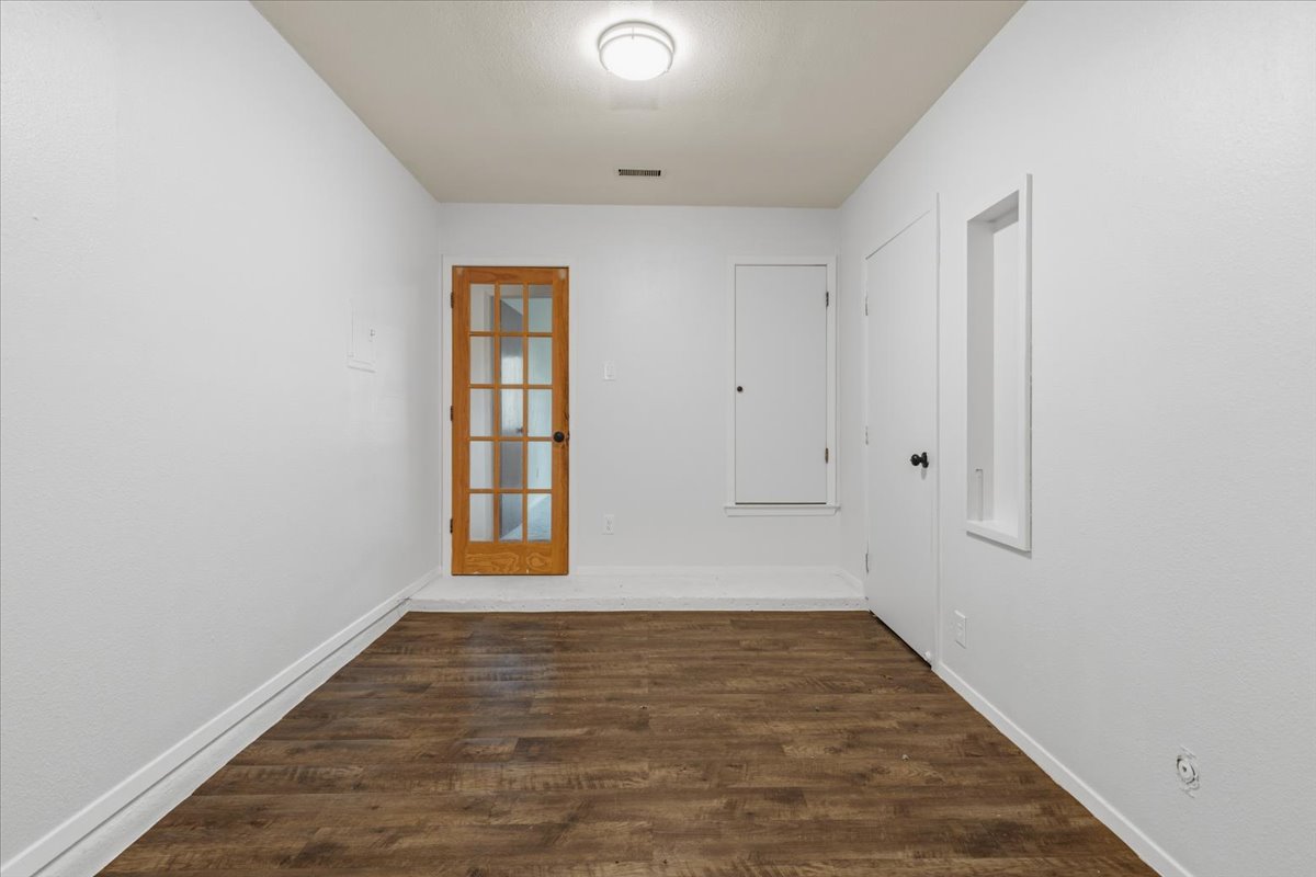 511 Suzzane Road Pflugerville, TX 78660 - Photo 22 of 35 Flex room featuring wood finished floors and baseboards