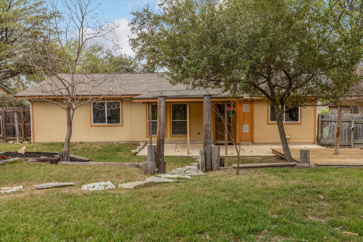 511 Suzzane Road Pflugerville, TX 78660 - Photo 26 of 35 a view of a house with backyard and tree