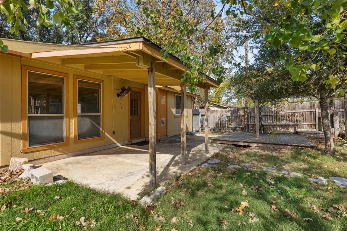 511 Suzzane Road Pflugerville, TX 78660 - Photo 26 of 34 Fenced backyard with a covered patio area