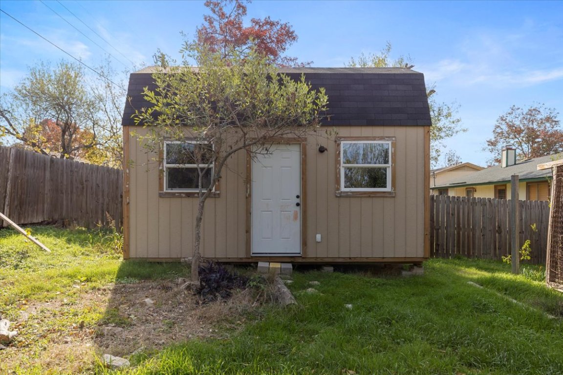 511 Suzzane Road Pflugerville, TX 78660 - Photo 29 of 34 View of outbuilding featuring a fenced backyard