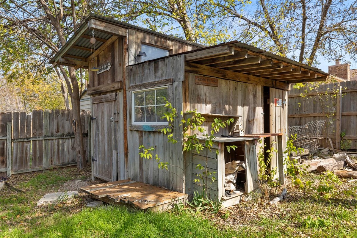 511 Suzzane Road Pflugerville, TX 78660 - Photo 33 of 37 View of shed featuring a fenced backyard