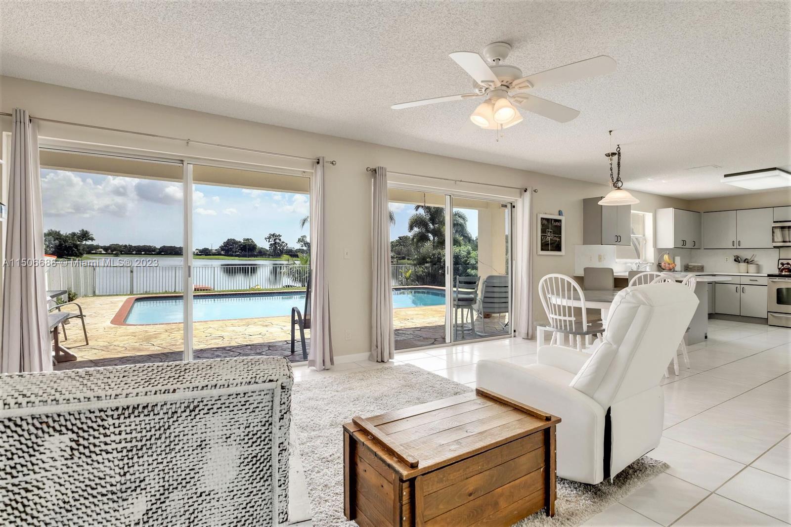 7289 Shell Ridge Terrace Lake Worth, FL 33467 - Photo 14 of 55 a living room with furniture