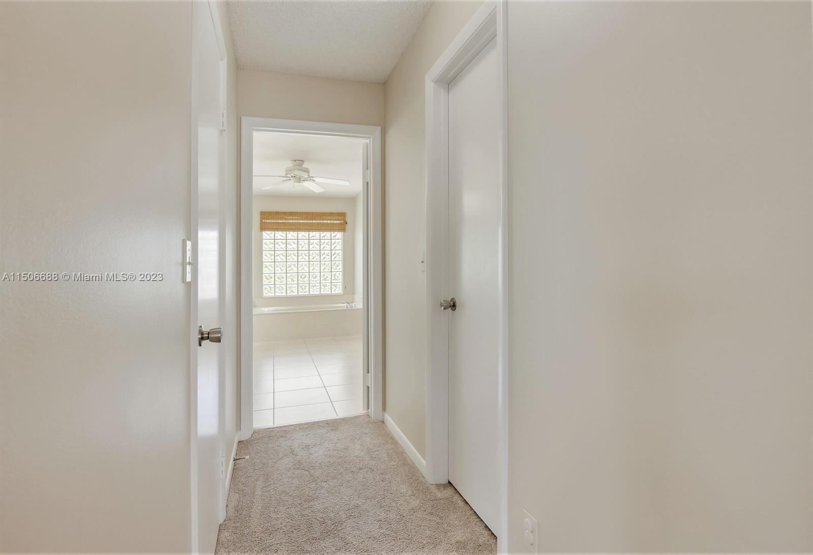 7289 Shell Ridge Terrace Lake Worth, FL 33467 - Photo 22 of 55 a view of a bathroom with a glass door