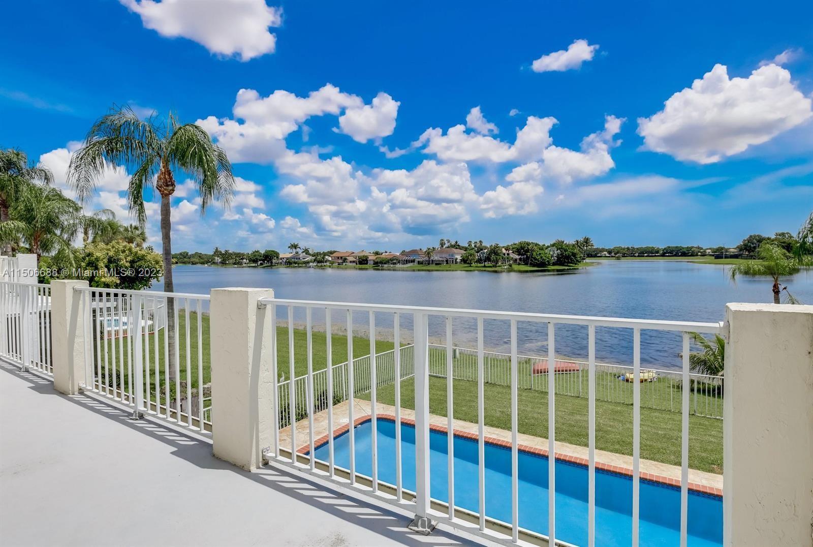 7289 Shell Ridge Terrace Lake Worth, FL 33467 - Photo 50 of 55 a view of a balcony with lake view and mountain view