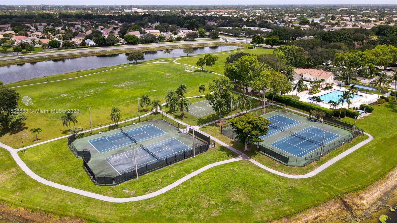 7289 Shell Ridge Terrace Lake Worth, FL 33467 - Photo 53 of 55 an aerial view of a swimming pool