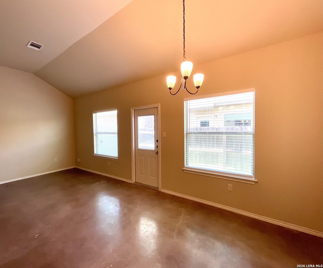 2575 Pahmeyer Road New Braunfels, TX 78130 - Photo 11 of 31 a view of an empty room with a window and wooden floor