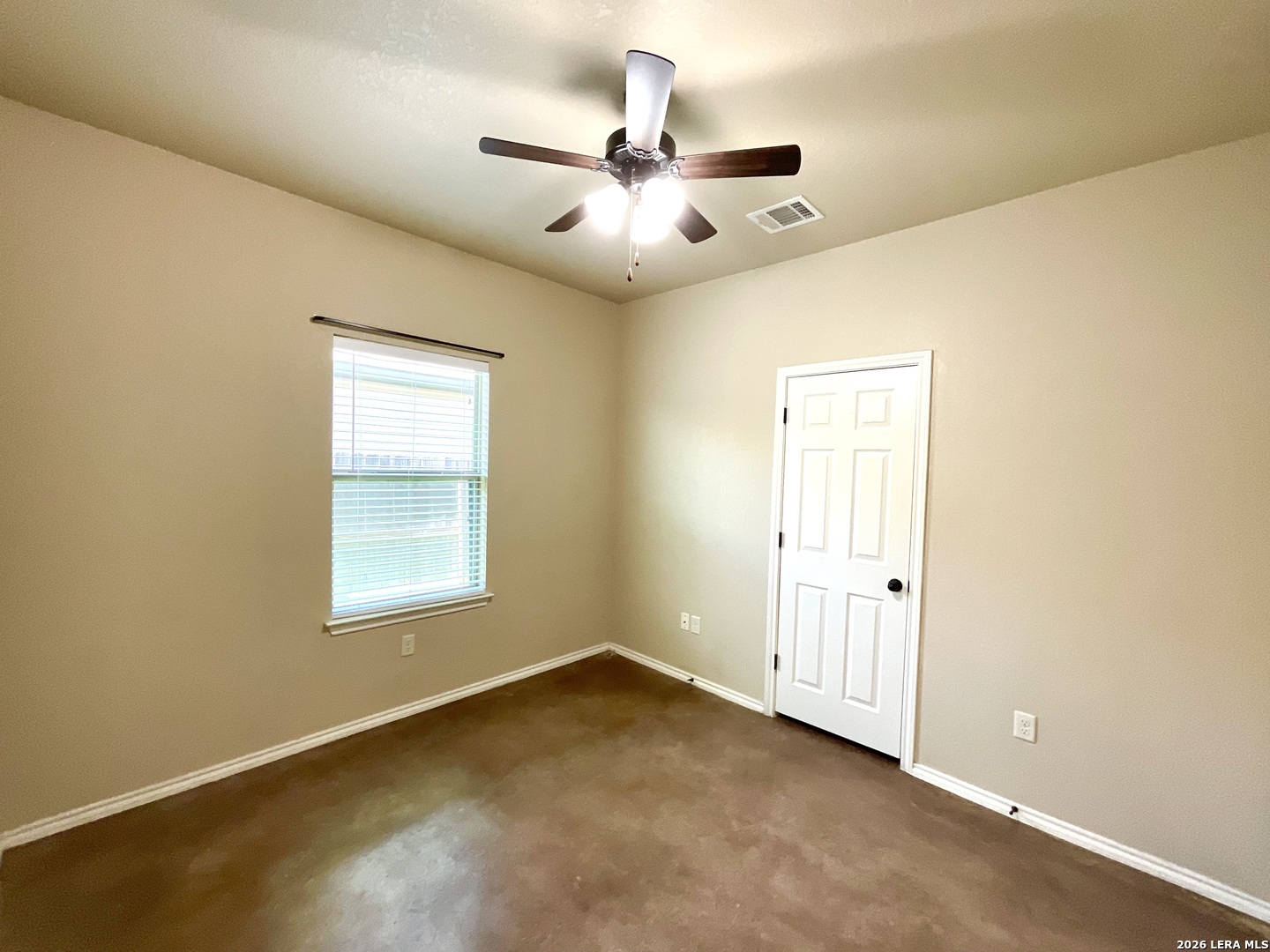 2575 Pahmeyer Road New Braunfels, TX 78130 - Photo 18 of 31 an empty room with a window and a ceiling fan