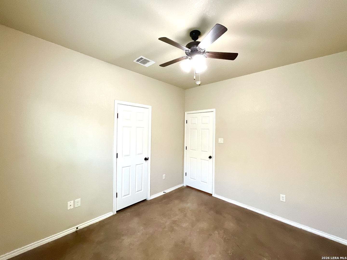 2575 Pahmeyer Road New Braunfels, TX 78130 - Photo 19 of 31 an empty room with a ceiling fan and a window