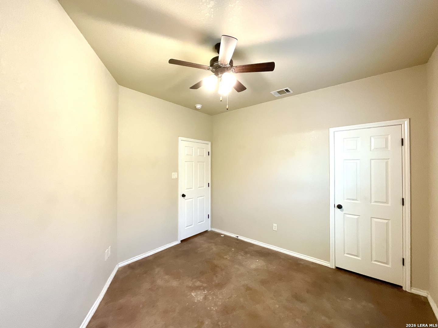 2575 Pahmeyer Road New Braunfels, TX 78130 - Photo 22 of 31 an empty room with closet and a ceiling fan