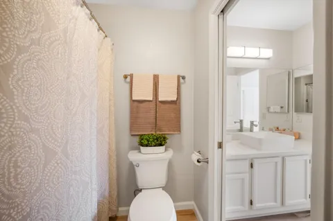 a view of an outdoor space with deck and a garden