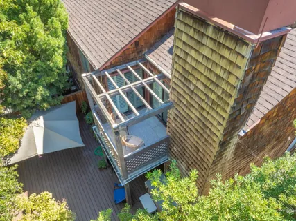 a view of balcony with furniture