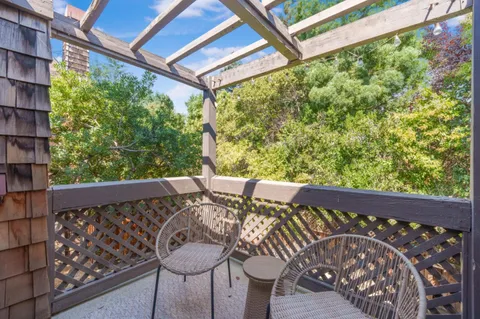 an aerial view of a house with a garden