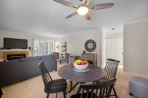 a view of a livingroom with furniture window and outside view