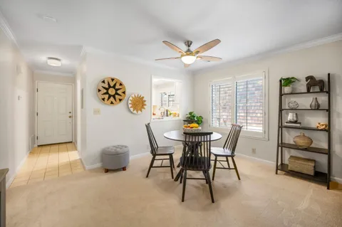 a kitchen with a sink a refrigerator and window