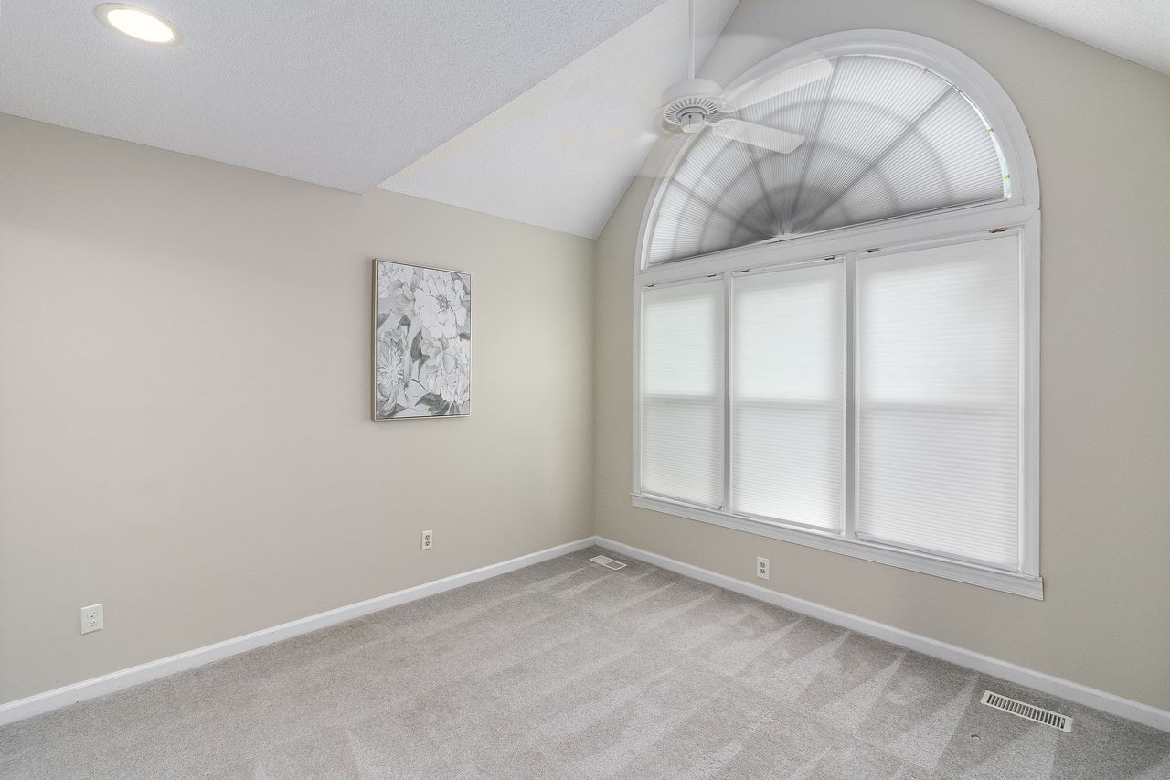 Spacious room with large windows make this space bright and comfortable.