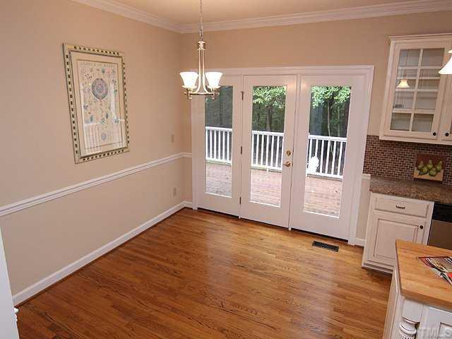 Welcoming breakfast nook with pretty view of the wooded back yard. Don't forget - all new interior and exterior paint! Breakfast Area
