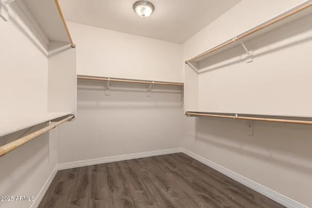 a view of an empty walk in closet