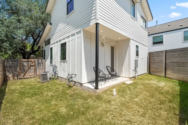 a house with trees in front of it
