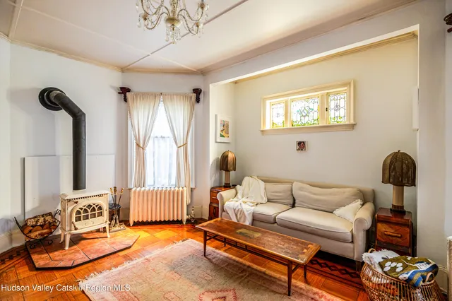 a view of walk in closet and bedroom