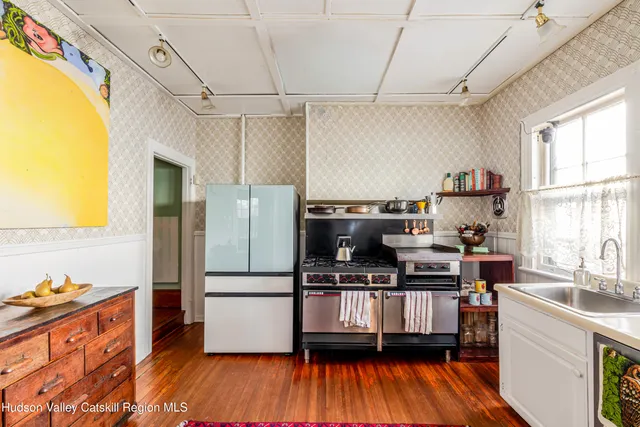 a view of balcony with furniture