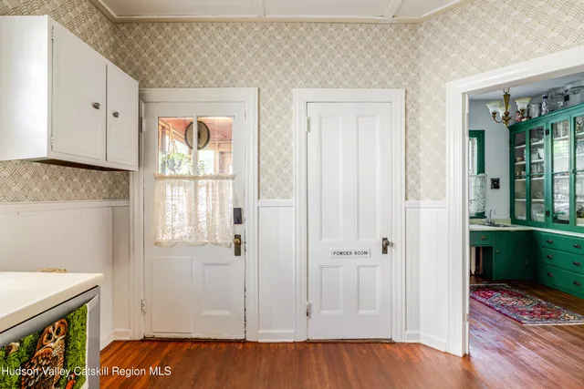 a view of stairs and with wooden floor