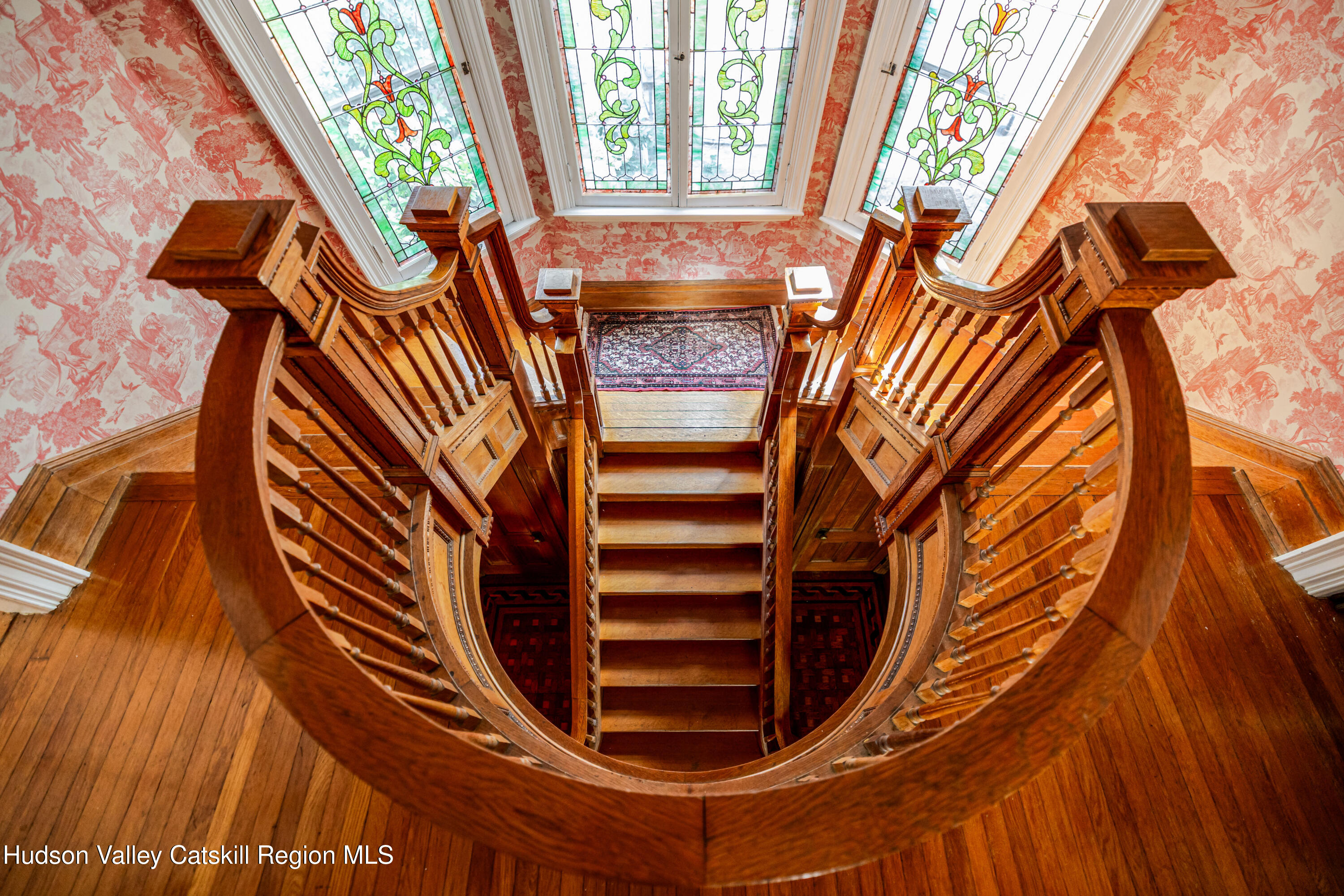 119 Academy Street Poughkeepsie, NY 12601 - Photo 26 of 60 a view of stairs and with wooden floor