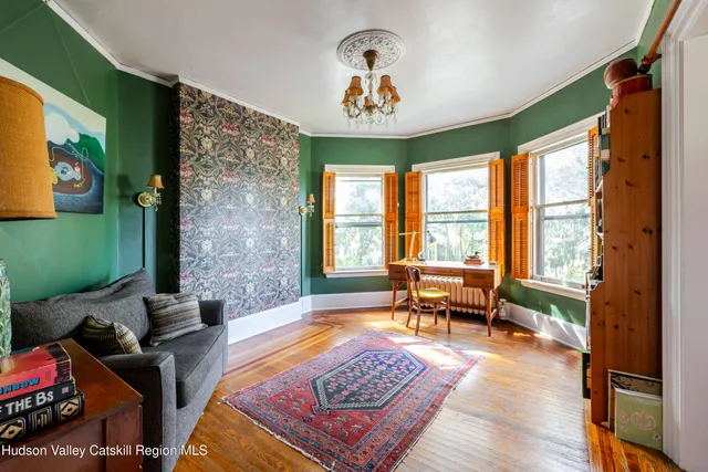 a view of entryway with wooden floor
