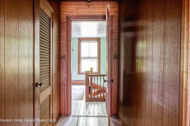 a view of a swimming pool with sitting area