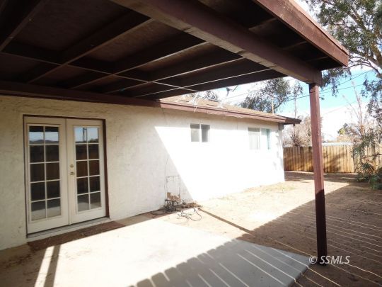 1612 South Yorktown Street Ridgecrest, CA 93555 - Photo 25 of 26 a view of a house with a door