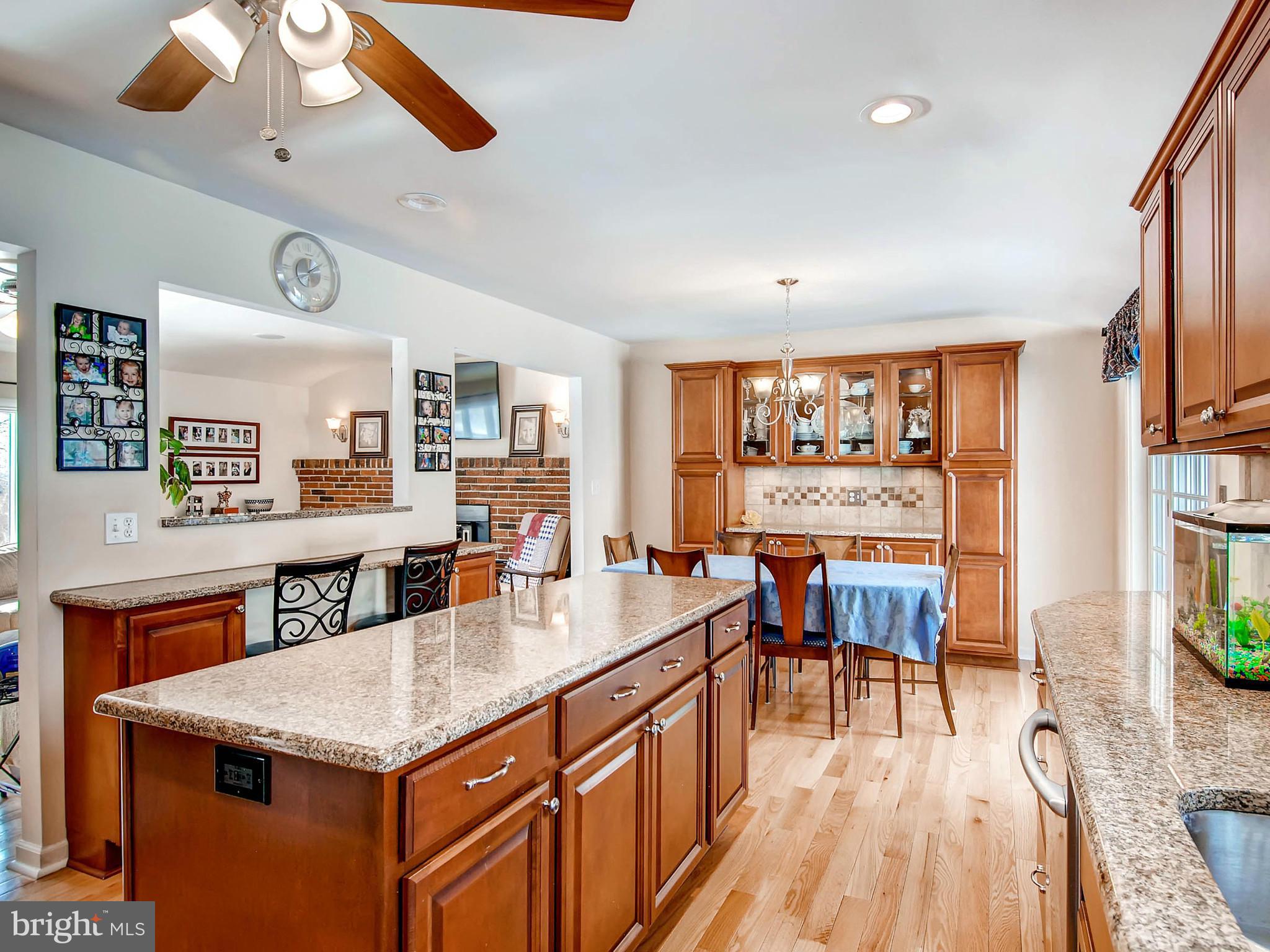2607 Fallston Road Fallston, MD 21047 - Photo 11 of 30 a kitchen with a table chairs and wooden floor