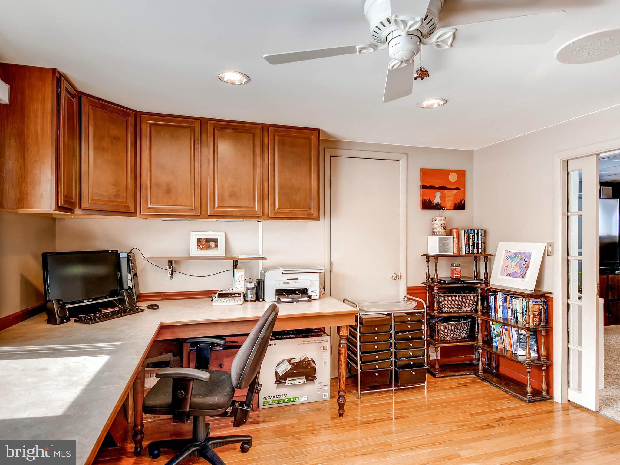 2607 Fallston Road Fallston, MD 21047 - Photo 21 of 30 a view of a kitchen with workspace and wooden floor