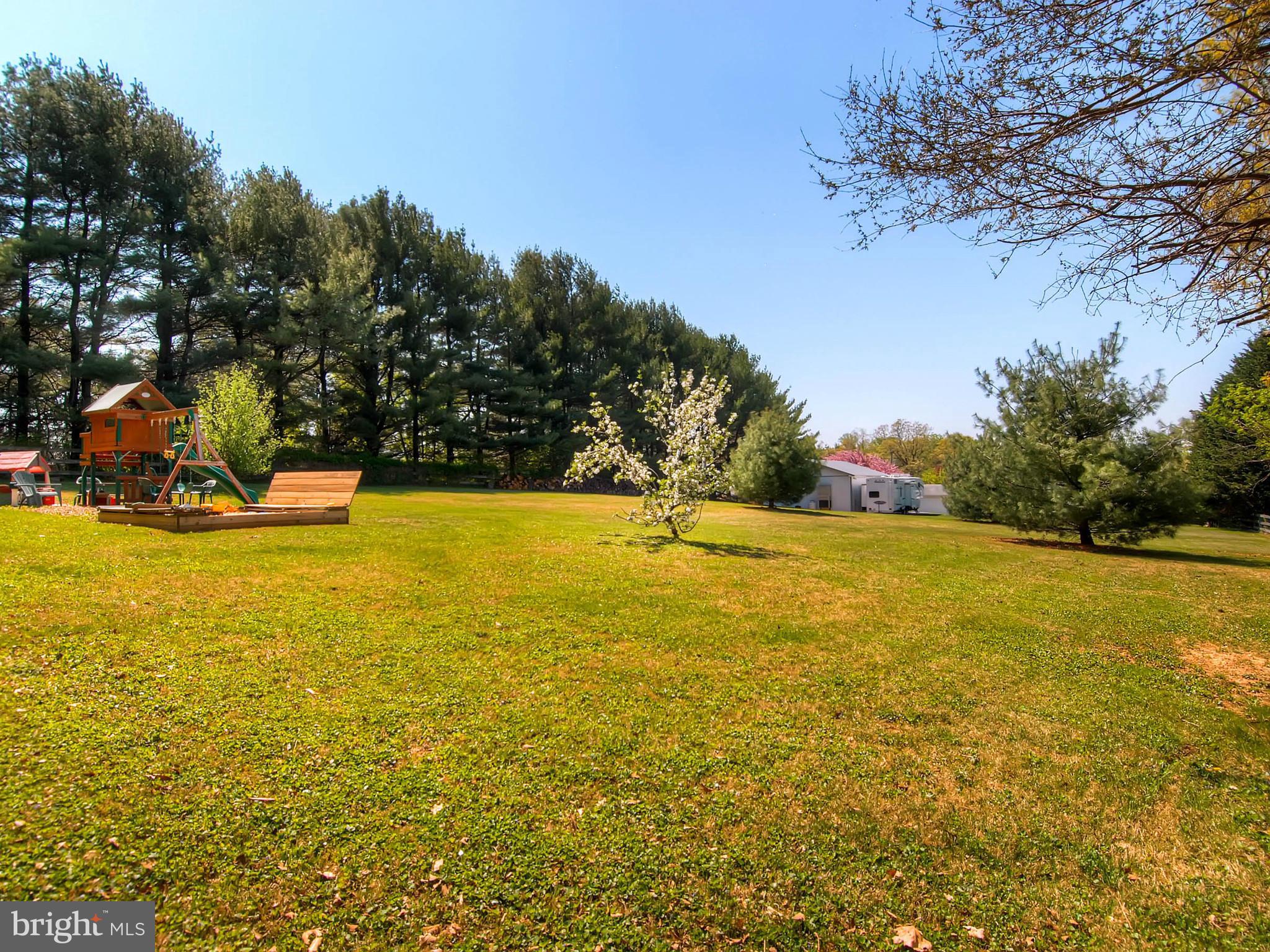 2607 Fallston Road Fallston, MD 21047 - Photo 26 of 30 a view of a swimming pool with an outdoor space and seating area
