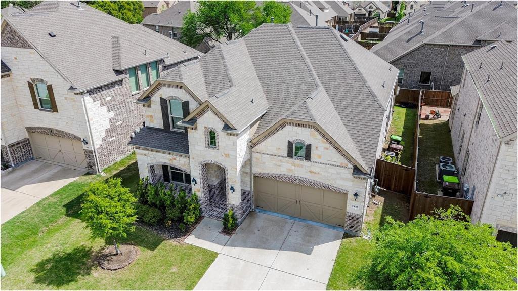 3920 Bentgrass Road Plano, TX 75023 - Photo 2 of 30 a aerial view of a house with a yard