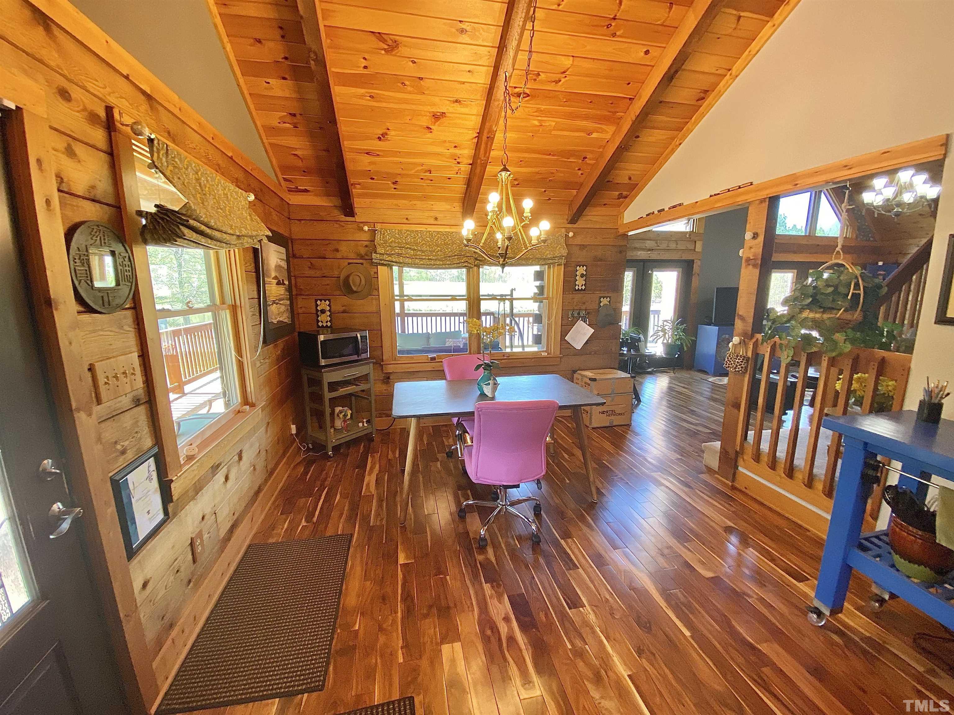 533 Enon Road Oxford, NC 27565 - Photo 14 of 95 a outdoor space with lots of furniture and wooden floor