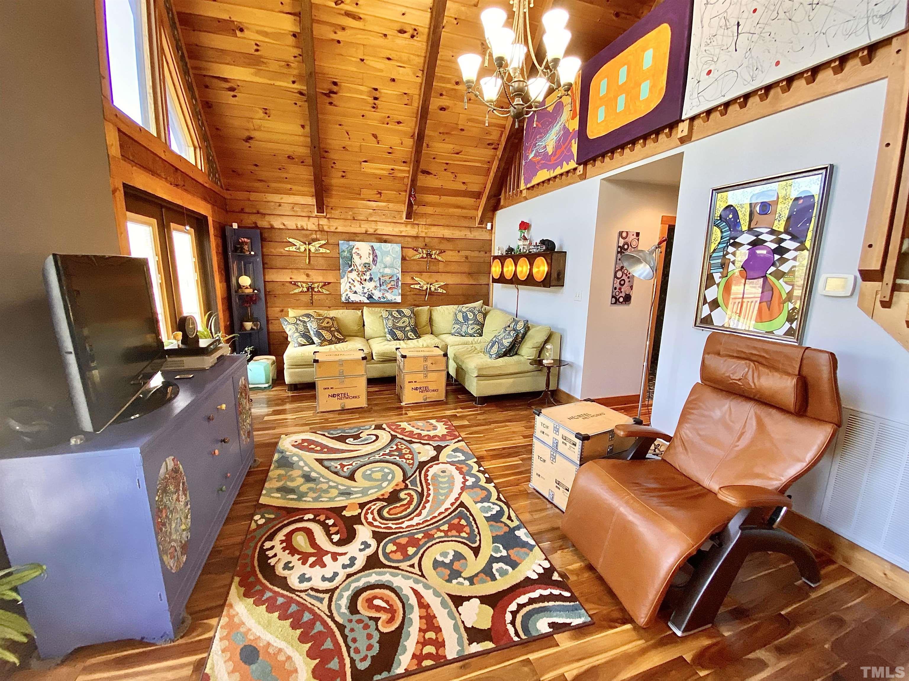 533 Enon Road Oxford, NC 27565 - Photo 16 of 95 a living room with furniture and a flat screen tv