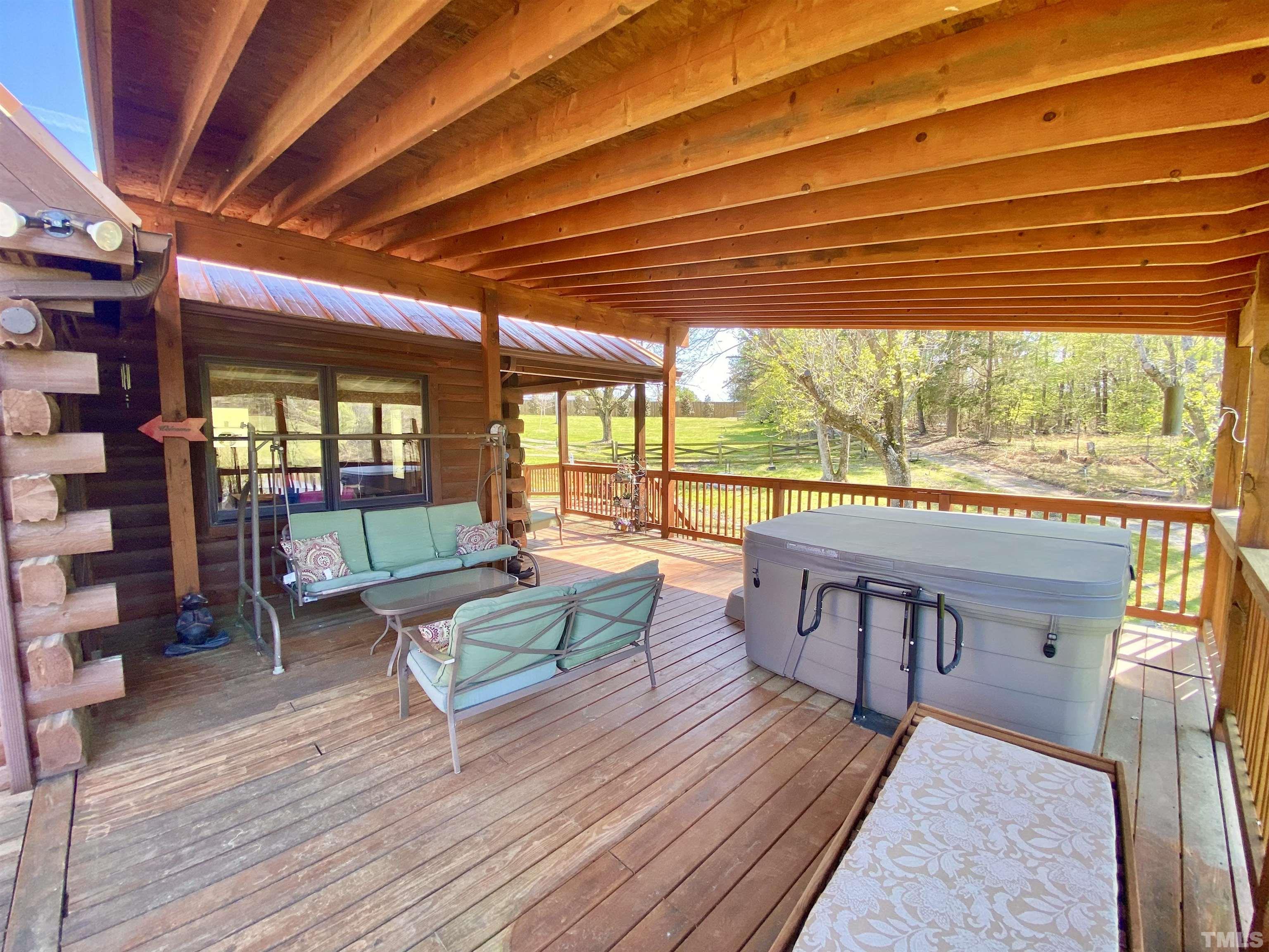 533 Enon Road Oxford, NC 27565 - Photo 33 of 95 a living room with furniture and a large window