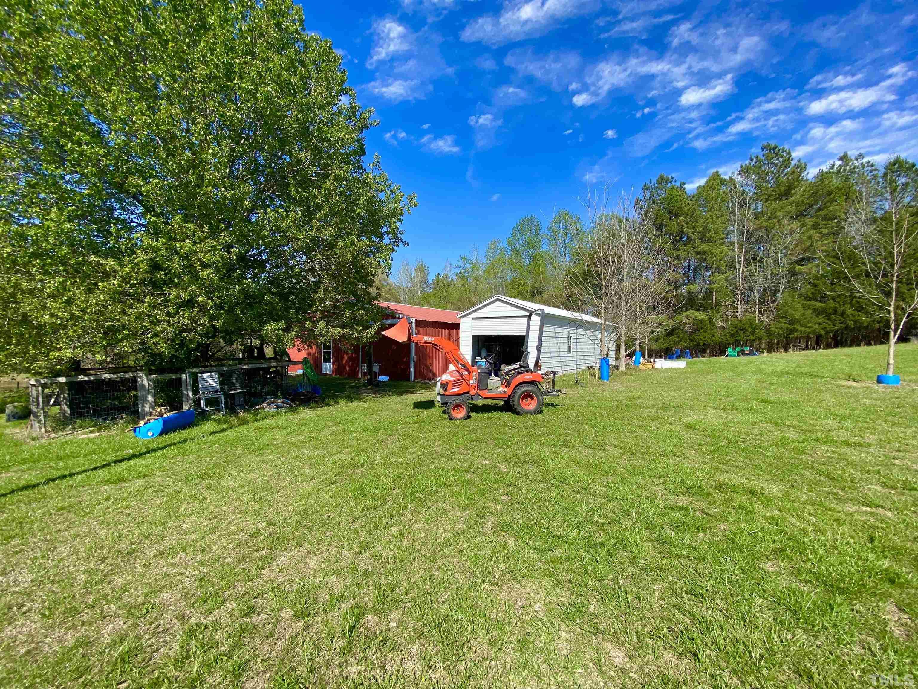 533 Enon Road Oxford, NC 27565 - Photo 48 of 95 a view of a house with backyard and garden