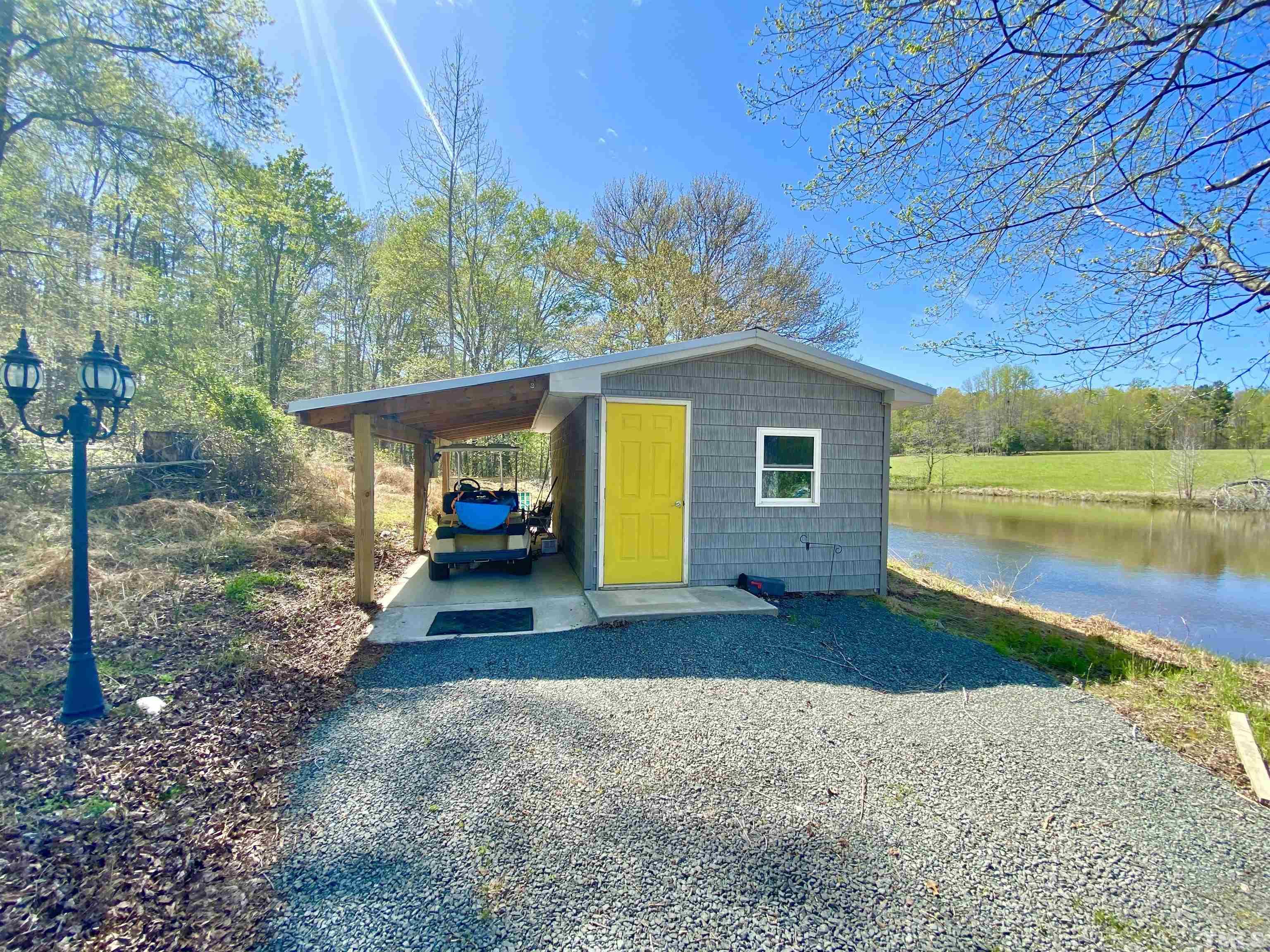 533 Enon Road Oxford, NC 27565 - Photo 62 of 95 a front view of a house with a yard and garage