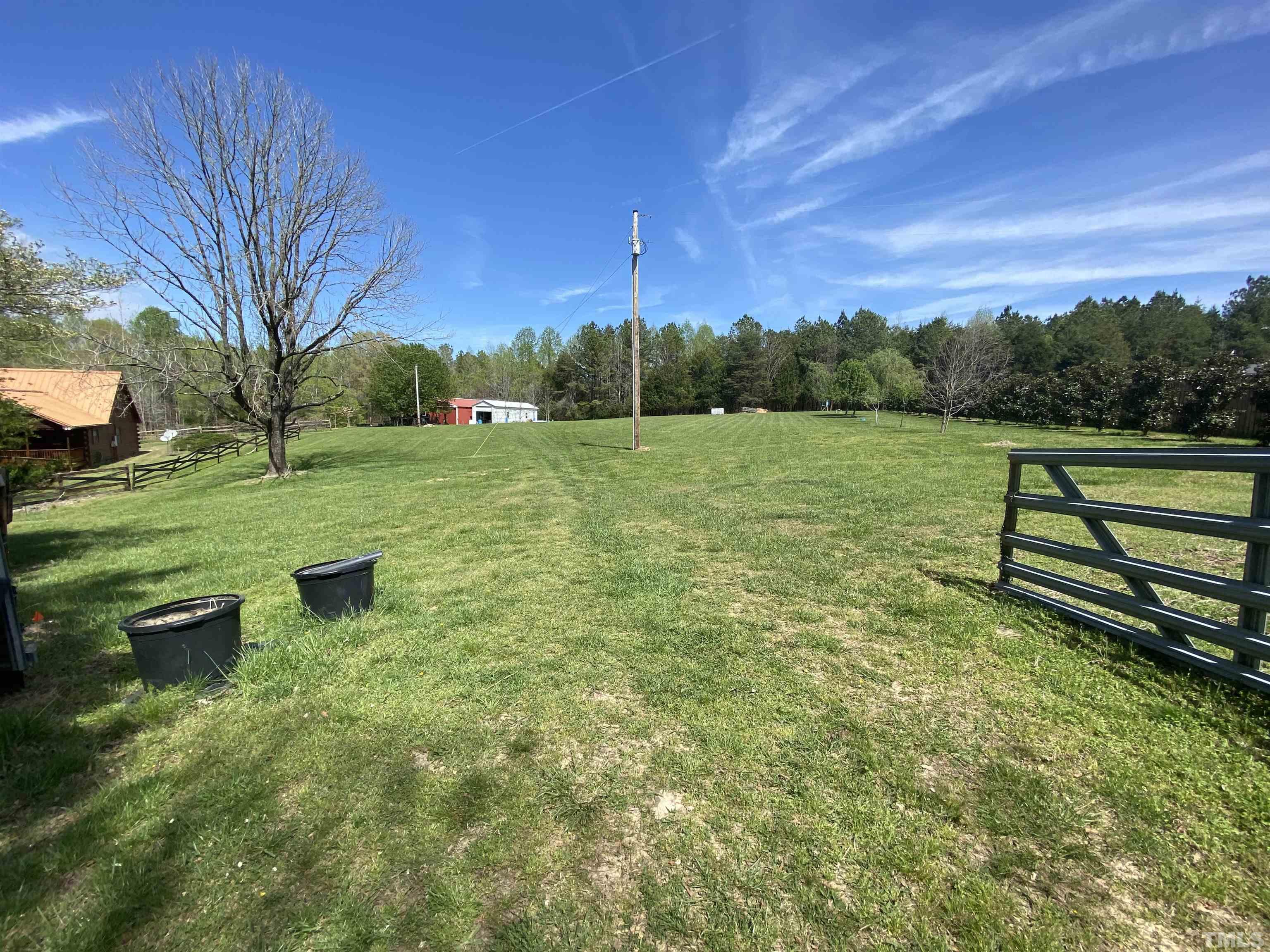 533 Enon Road Oxford, NC 27565 - Photo 69 of 95 a view of a garden with an outdoor space