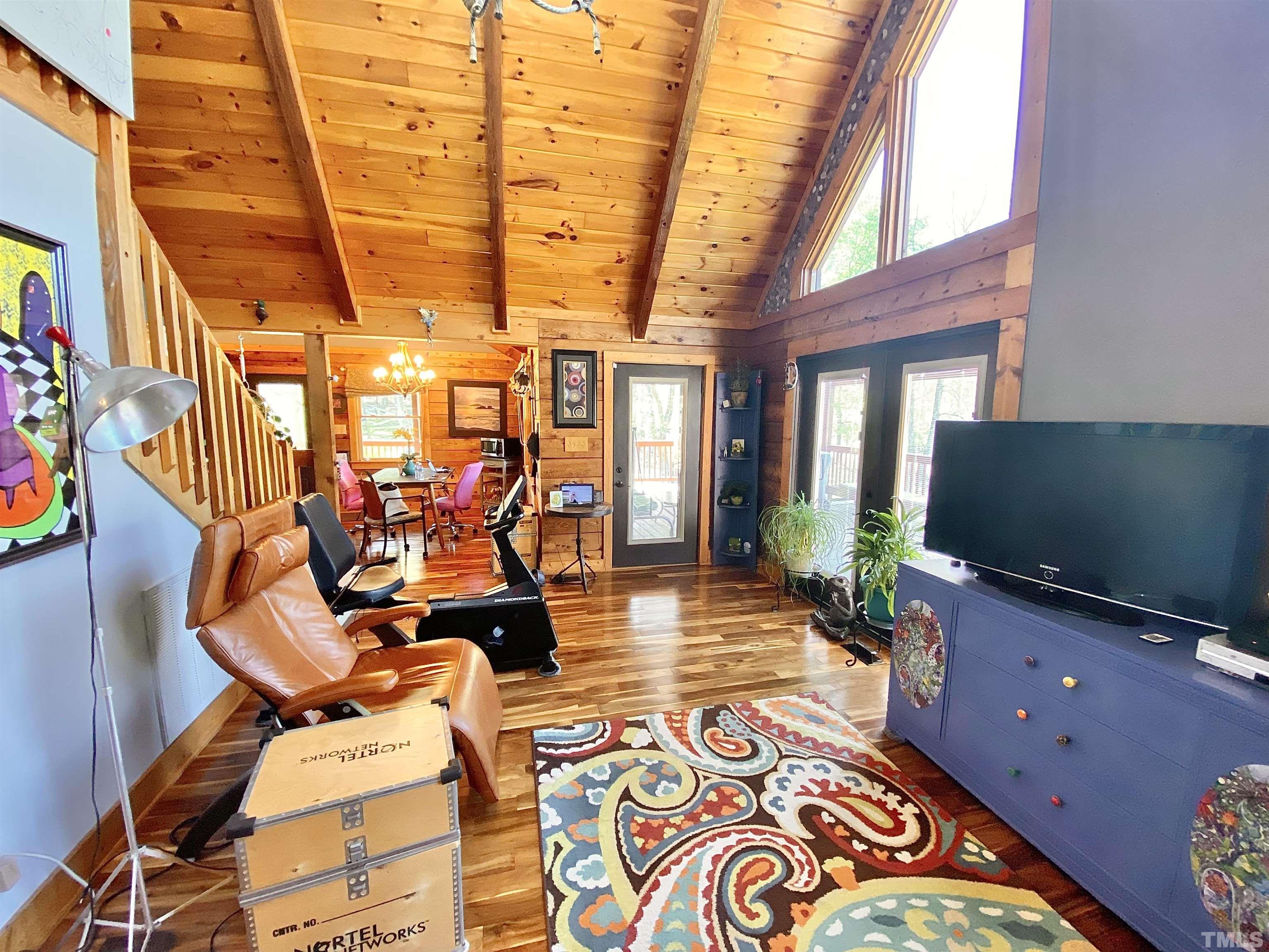 533 Enon Road Oxford, NC 27565 - Photo 8 of 95 a living room with furniture and a flat screen tv