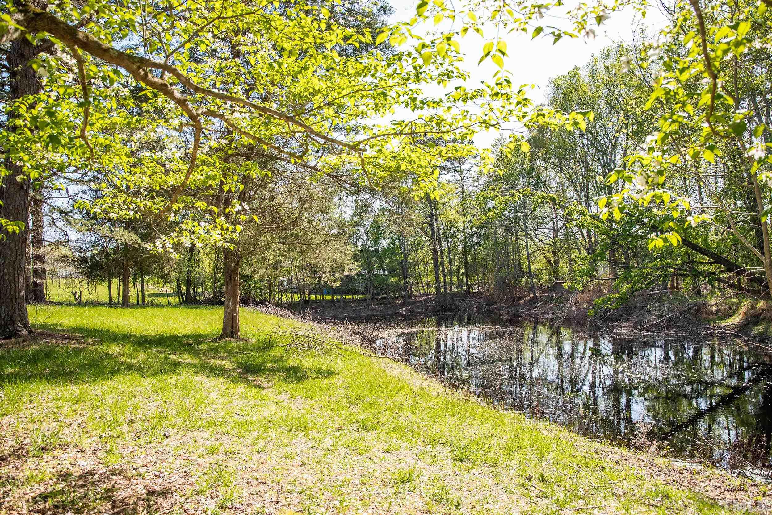 533 Enon Road Oxford, NC 27565 - Photo 91 of 95 a swimming pool with an outdoor space and seating area