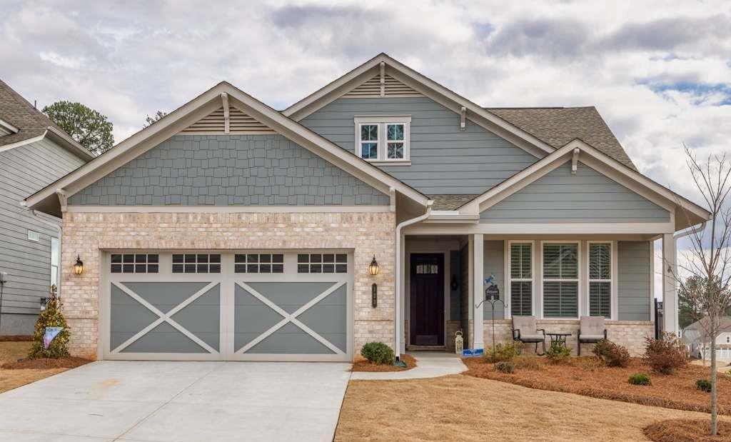 123 Rabun Court Hoschton, GA 30548 - Photo 1 of 1 a front view of a house with a yard