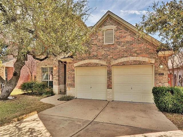 1832 Nelson Ranch Loop Cedar Park, TX 78613 - Photo 1 of 15 Brick facade with arched accents welcomes you to this charming residence.