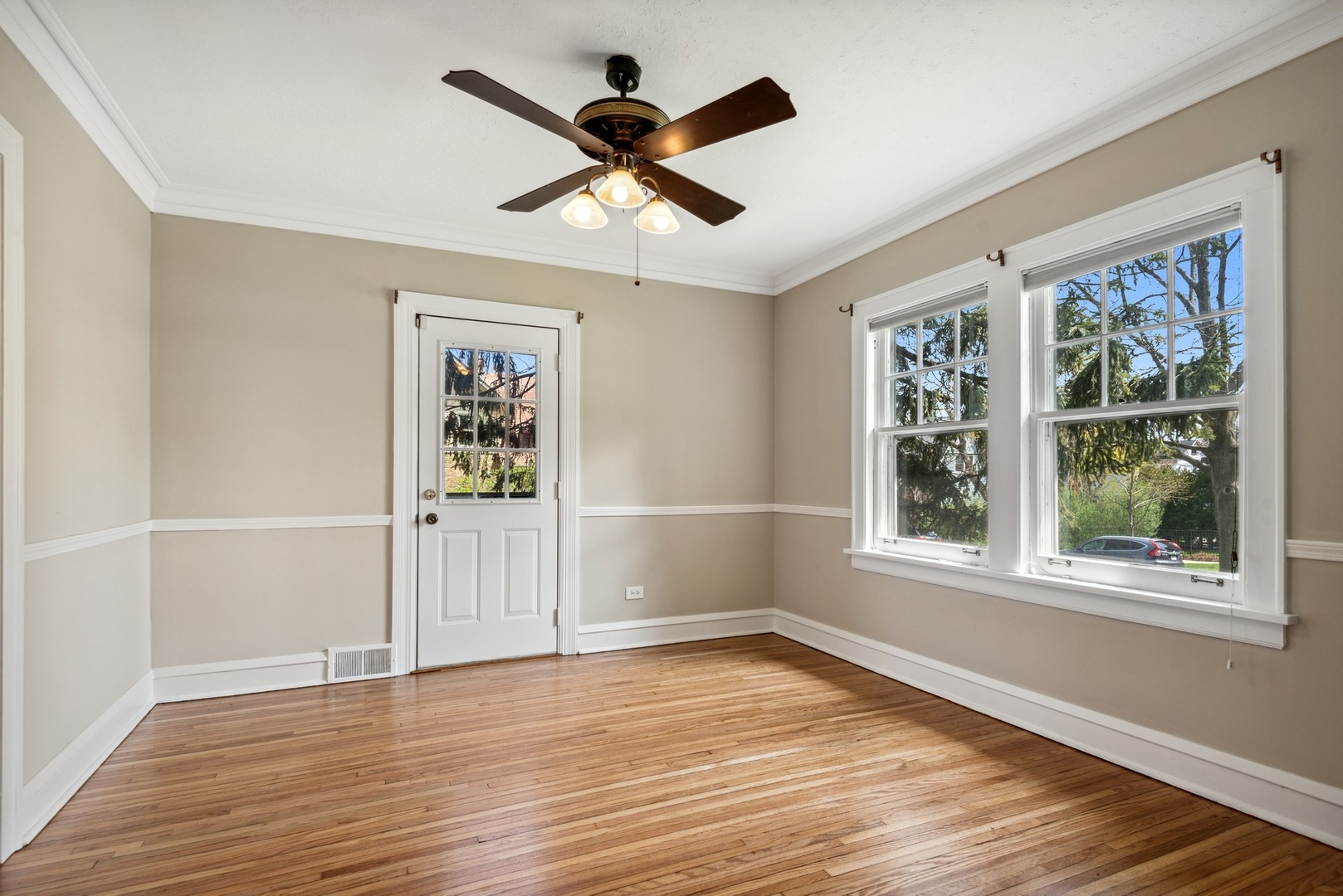 1130 Ridge Road Wilmette, IL 60091 - Photo 8 of 16 wooden floor in an empty room with a window