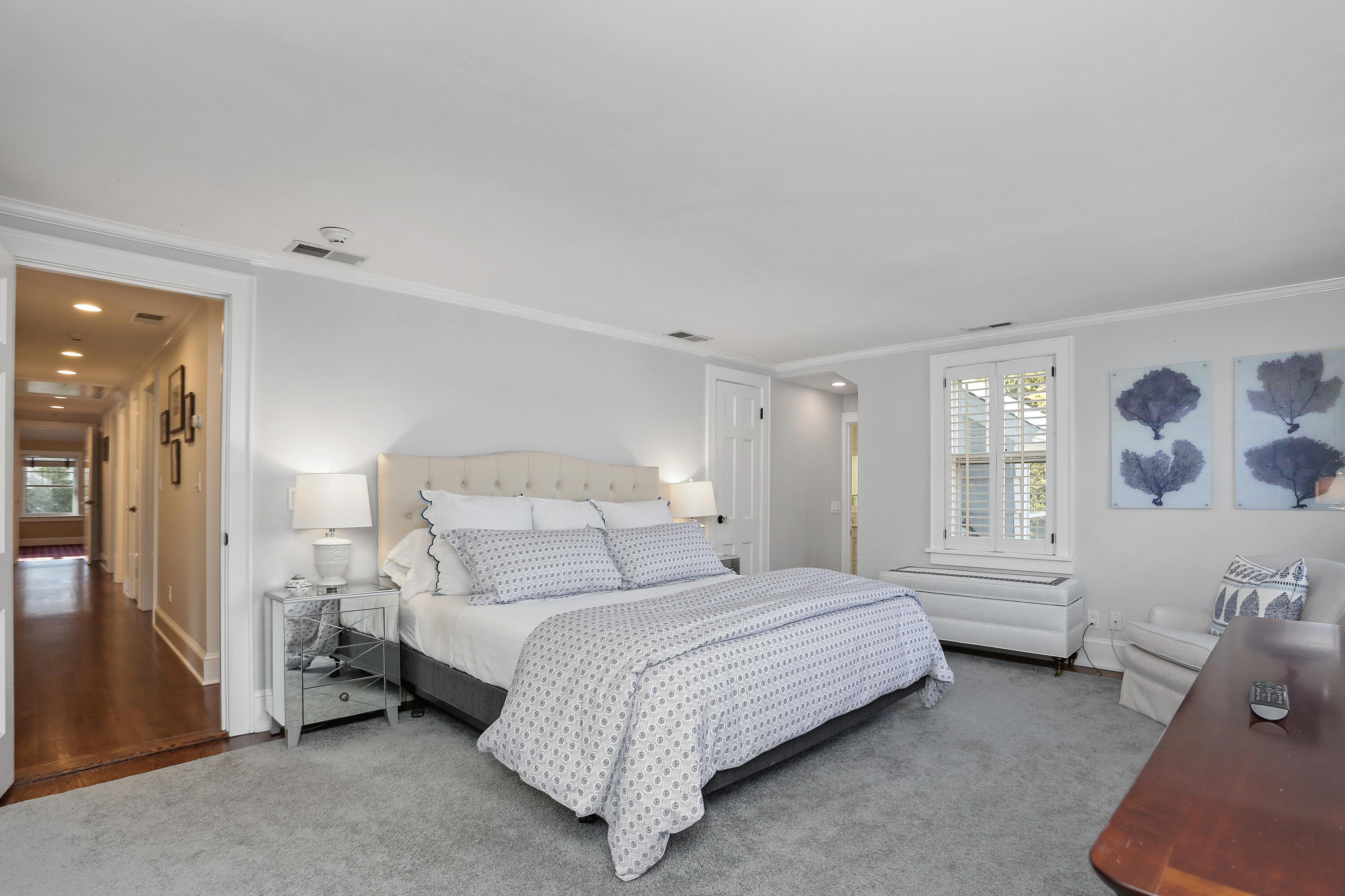 8 Beach Drive Darien, CT 06820 - Photo 16 of 27 a bedroom with a bed and a couch