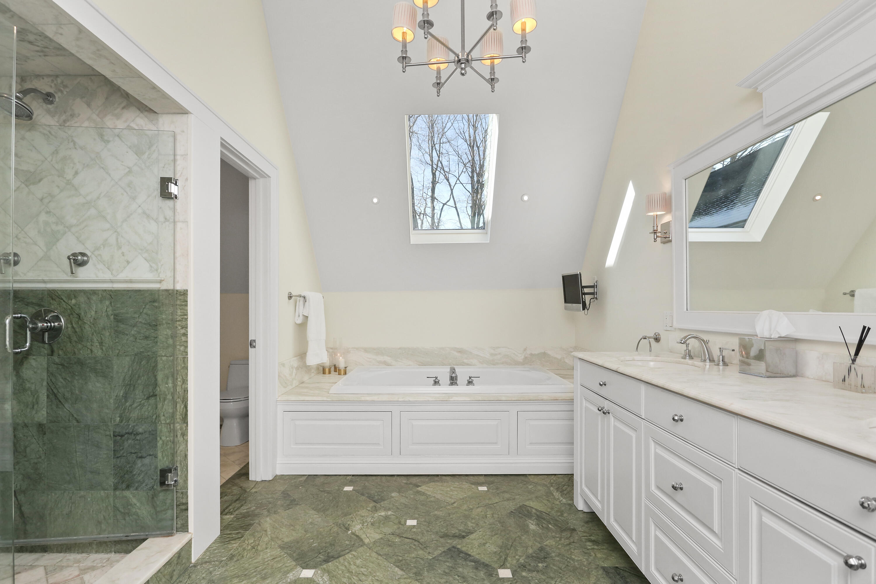 8 Beach Drive Darien, CT 06820 - Photo 17 of 27 a bathroom with a double vanity sink mirror and shower