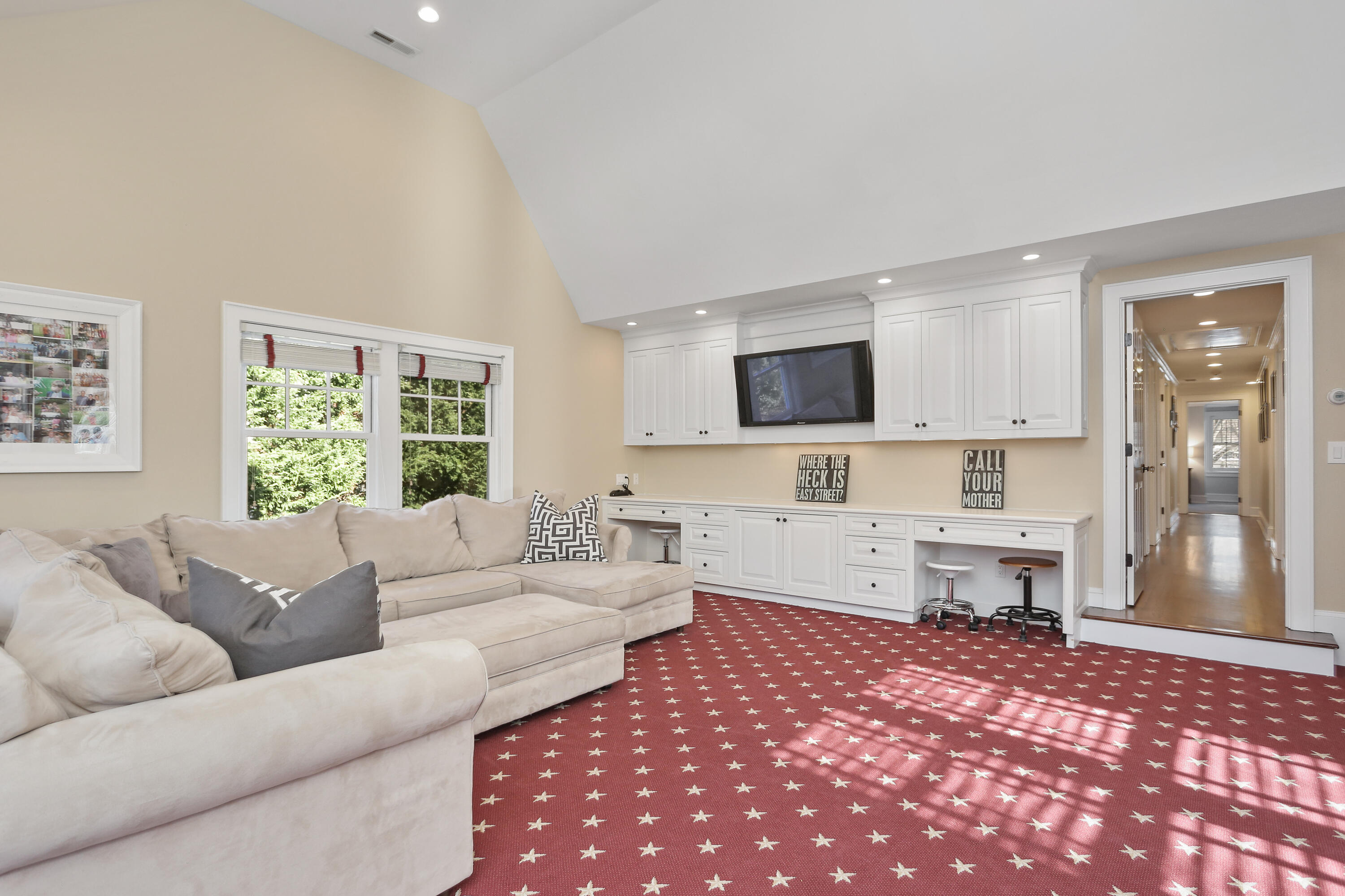 8 Beach Drive Darien, CT 06820 - Photo 22 of 27 a living room with furniture and a large window